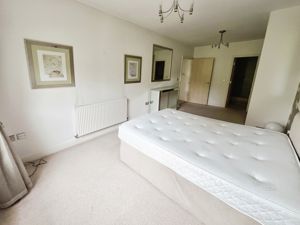 Bedroom One- click for photo gallery